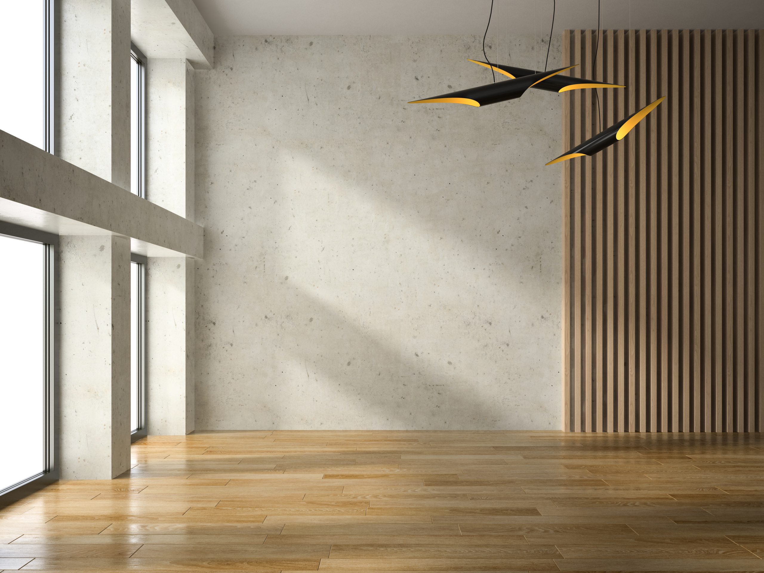 Renoviertes Zimmer mit neuem Boden und Wänden in Betonoptik